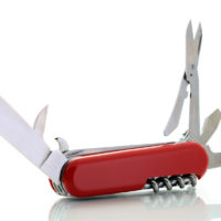 red pocket knife unfolded